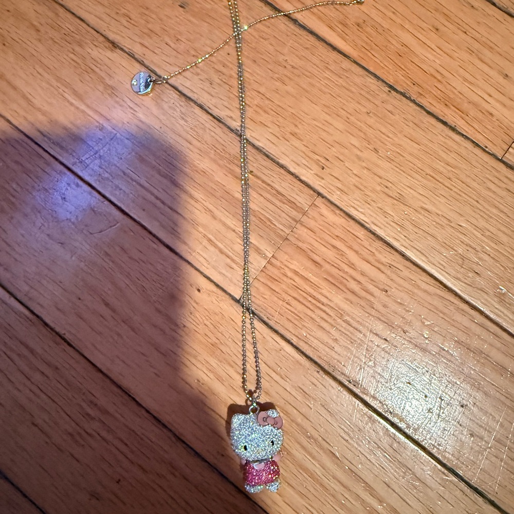 2012 Swarovski Hello Kitty Gold Chain Necklace with Pink Bow and Sparkle